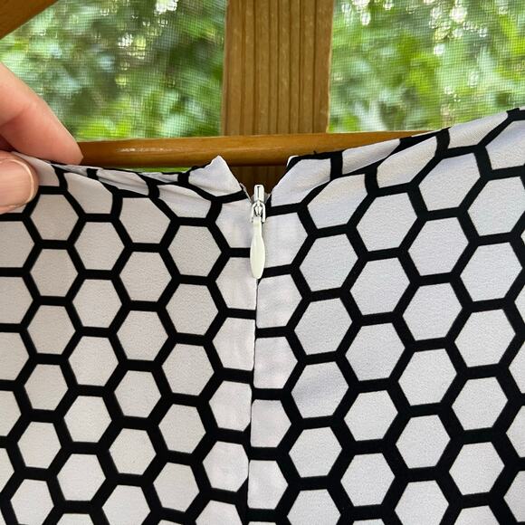 Elegant Black and White Polka Dot Dress with Red Accents - Picture 4 of 9